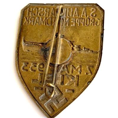 A 1933 S.A. AUFMARSCH GRUPPE NORDMARK BADGE
A 1933 S.A. Aufmarsch Gruppe Nordmark Badge in die stamped bronze, 46mm in very fine condition