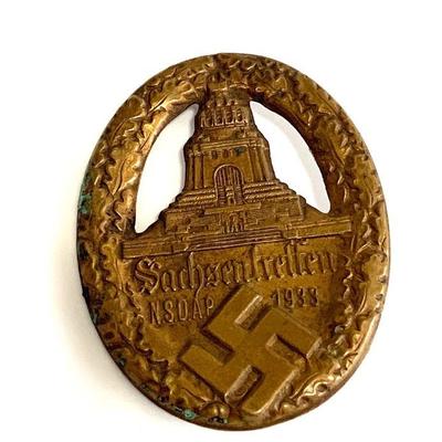 A 1933 SAXONY NSDAP MEET BADGE
A 1933 Sachsentreffen Badge, Bronze, Verticle Pinback, unmarked measures approximately 47mm x 36mm
