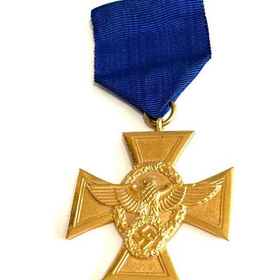 GERMAN THIRD REICH 25 YEARS POLICE LONG SERVICE AWARD IN GOLD
Gold Cross with embossed eagle. On the back Fur Treue Dienste in der...