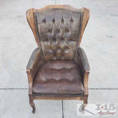 Wood and Leather Armchair
Dark leather chair. 18" seat, 43" back.