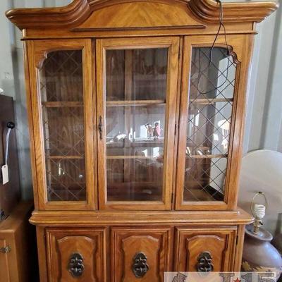Wooden Hutch
Has silverware drawer, light shades and cubboard space. Measures approx 17"x55"x80"
