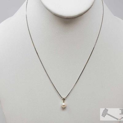 14k Pearl and Diamond Pendent with chain Weighs Approx 2g
14k Diamond Necklace, Weighs Approx 2g, Measures Approx 17.5"
