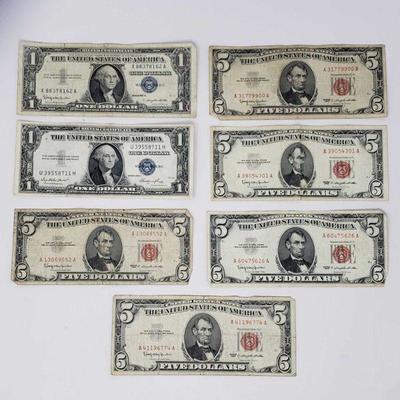 7 Red and Blue Seal Dollar Bills
5 Red and 2 Blue Seal Dollar Bills