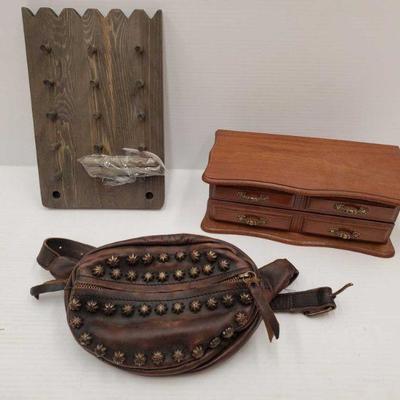 1000: Jewelry Display, Jewelry Box with Costume Jewelry and a Studded Fanny Pack
Jewelry Display, Jewelry Box with Costume Jewelry and a...