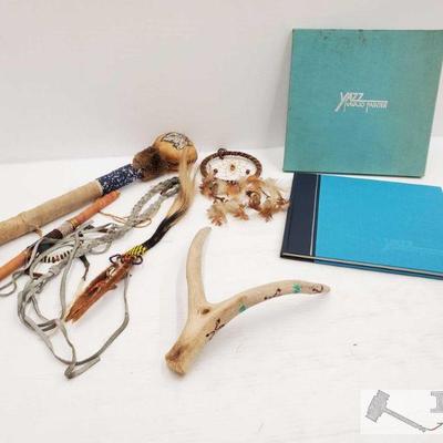 4406: Native American Decor and Yazz Navajo Painter Book
Measures approx 12" to 18". Includes painted antlers, a dream catcher...
