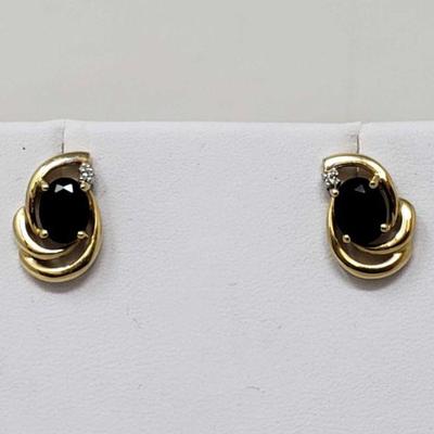 Pair of 14k Gold Diamond Earrings 3.6g
Weighs Approx 3.6g