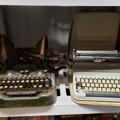 5550: Vintage Typewriters
Torpedo typewriter with carrying case zippered bag. Worn and dirty Oliver standard typewriter.