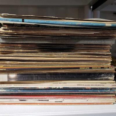 55562: 50+ Vinyl Records Stack
Bruce Springsteen, Doobie Brothers, The Smiths, Boz Scaggs and more. Christmas music, theatre music, etc.