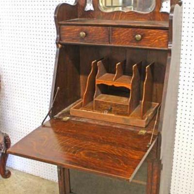  ANTIQUE Oak all Original Fancy Carved Slant Front Desk with Bookcase Bottom and Fancy Mirror Top

Auction Estimate $300-$600 â€“ Located...