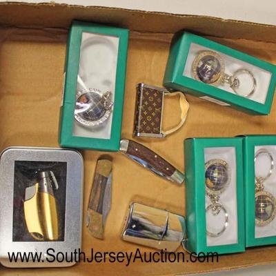  Box Lot of Lighters, Pocket Knives, and Key Chains

Auction Estimate $20-$50 â€“ Located Glassware 