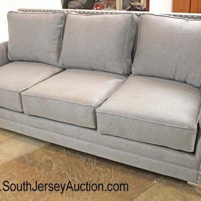  NEW Upholstered Grey Contemporary Sofa with Tack Decorations

Auction Estimate $300-$600 â€“ Located Inside 