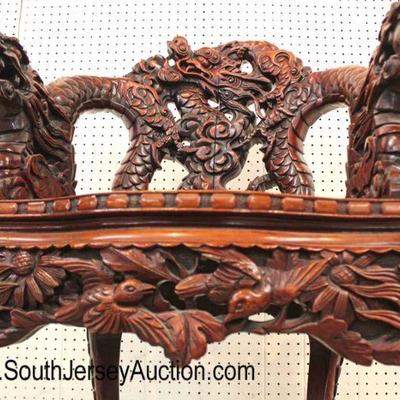  Early Asian Highly Carved and Ornate Dragon Head Hard Wood Arm Chair

Auction Estimate $300-$600 â€“ Located Inside 