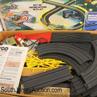  Vintage â€œTycoâ€ Slot Car Racetrack with Cars

Auction Estimate $100-$200 â€“ Located Glassware 