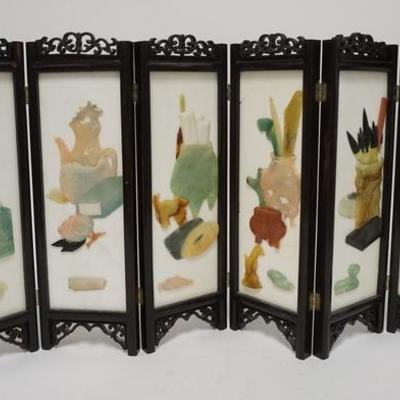 1218  SIX PART TABLE TOP FOLDING SCREEN W/ RELIEF DECORATIONS IN A NICELY CARVED FRAME, ONE PANEL IS CRACKED, 14 1/2 IN H, EACH PANEL IS...