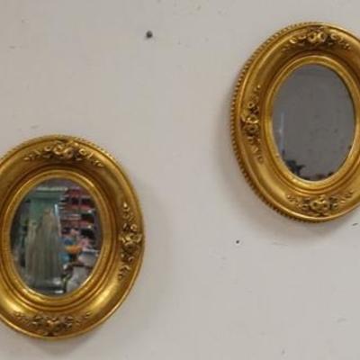 1205  PAIR OF OVAL GUILT MIRRORS W/ RELIEF FLORAL DESIGN, 11 1/2 IN X 13 1/2 IN 

