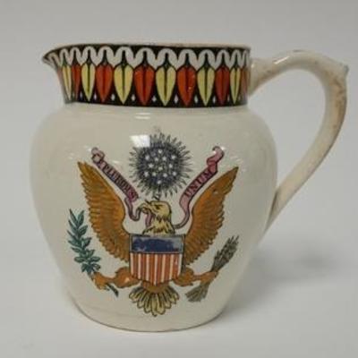 1071  ADAMS TUNSTALL CREAMER WITH AMERICAN EAGLE ON BOTH SIDES. 4 3/4 IN H
