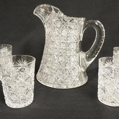 1054  AMERICAN BRILLIANT CUT 5 PC WATER SET. PITCHER HAS A HAND FORMED ICE LIP.  9 1/4 IN H
