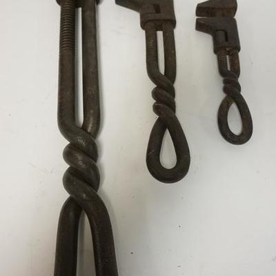 1006   GROUP OF 3 ANTIQUE IRON WRENCHES WITH TWIST HANDLES. POSSIBLY RAILROAD. LARGEST IS 21 IN
