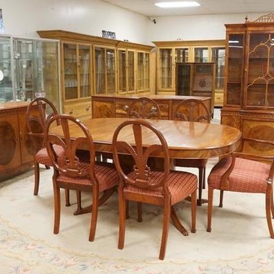 1036  10 PIECE CARVED DINING ROOM SUITE. TABLE WITH OVAL PEDESTAL AND 2 LEAVES, 6 PLUME BACK CHAIRS, CHINA CABINET WITH LATTICE CREST,...