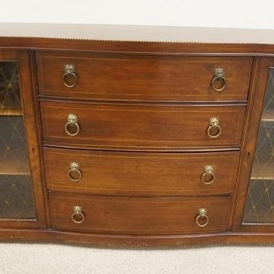 1014  COLONIAL MFG CO MAHOGANY SIDEBOARD WITH DESK SECTION. HAS INLAY DECORATION, 3 DRAWERS, LION HEAD PULLS AND 2 GLASS DOORS
