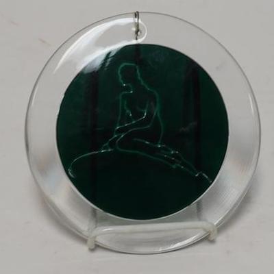 1279  CRYSTAL AND GREEN GLASS DISC W/ GIRL ON A ROCK, SIGNED AND DATED 1913, 6 1/2 IN D 
