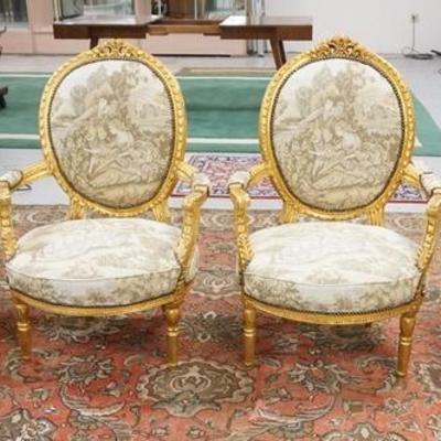 1062  SET OF 4 CARVED AND GILT ARM CHAIRS WITH UPHOLSTERED SEATS, BACKS AND ARM RESTS
