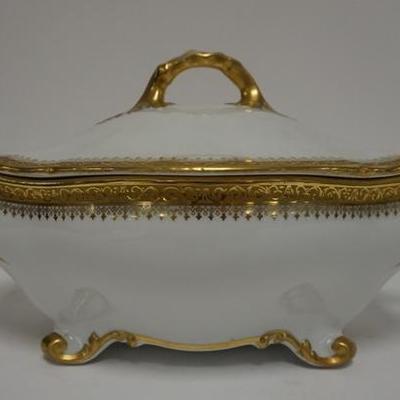 1025  GUERIN LIMOGES GOLD TRIMMED TUREEN MADE FOR HIGGINS AND SEITER. 13 1/4 IN ACROSS THE HANDLES. 7 1/2 IN H
