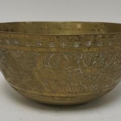 1251  ASIAN HEAVY BRASS OR BRONZE BOWL HAS ENGRAVED SCENES OF PEOPLE, SEALIFE, & DRAGONS ON THE BASE, 10 3/4 IN D 5 IN H 
