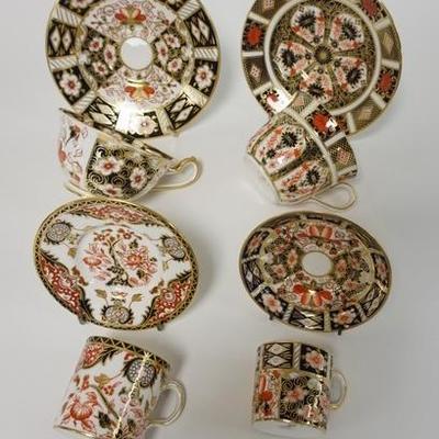 1076  4 DIFFERENT ROYAL CROWN DERBY CUPS AND SAUCERS IN IMARI STYLE PATTERNS. SMALLEST WAS MADE FOR TIFFANY AND COMPANY.
