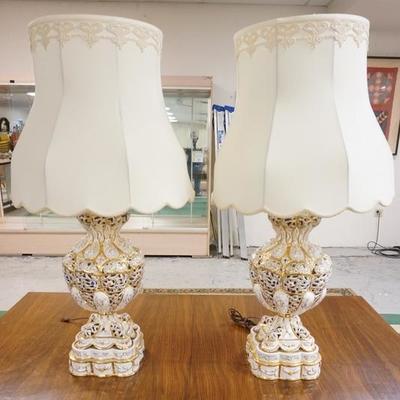 1061  PAIR OF RETICULATED PORCELAIN LAMPS WITH GOLD TRIM AND CLOTH SHADES. 37 IN H
