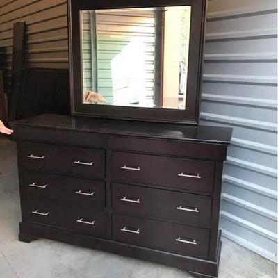 Beautiful solid dark wood dresser with detachable mirror, 6 drawers and top slim jewelry storage drawer.  Manufactured by Epoch.  The...