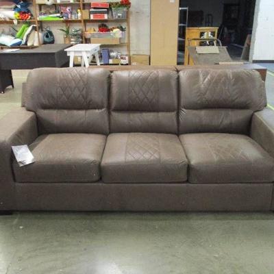 Brown Sofa....has shipping damage on one side along the bottom and on one edge