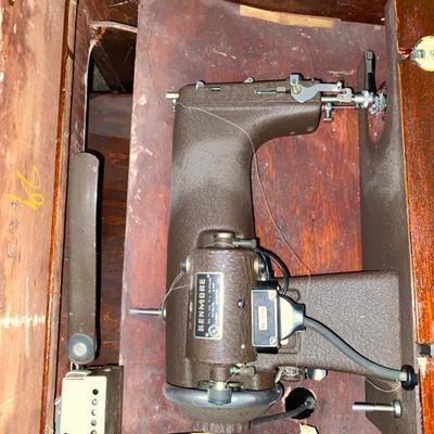 Dark wood sewing machine