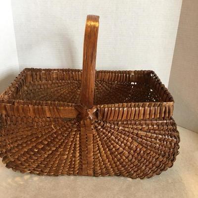 Early handwoven farm basket 