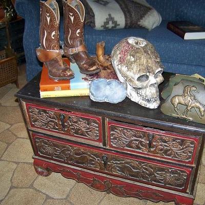 Vintage boots and carved chest