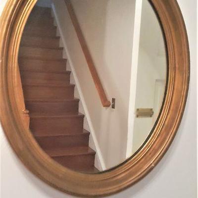 antique oval gold toned mirror
