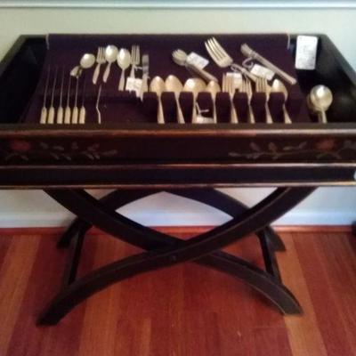 Back tole painted tray table and silverplate flatware