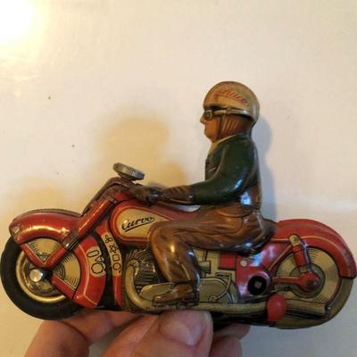vintage toy motorcycle with rider