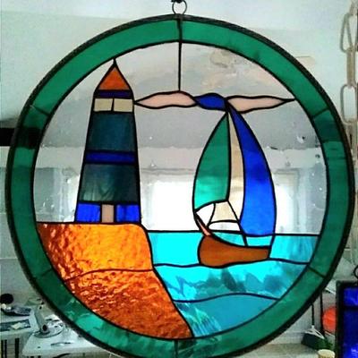 Stained glass circle with sailboats