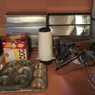 Wax/Foil Paper Dispensers, Egg Stractor, Muffin Pans, Hand Mixer, Toaster