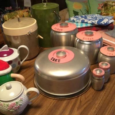 Teapots, Vintage Kromex Aluminum Cake, Canister, Salt and Pepper Set, Vintage Ice Buckets, Table Linens.