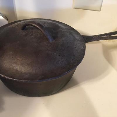 Large vintage cast iron pan with lid