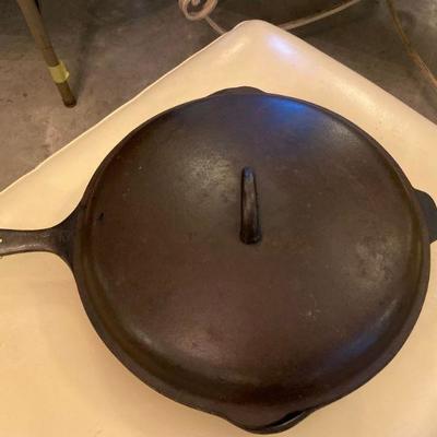 large cast iron skillet with lid