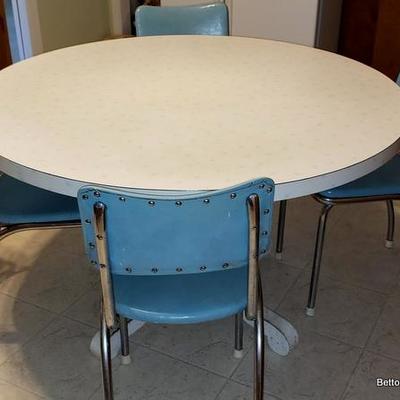 Fabulous Starburst top Vintage Dining Table and 4 chrome chairs
