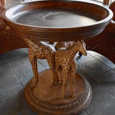 Side table with giraffe carving