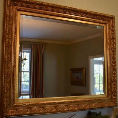 Beveled gilt mirror