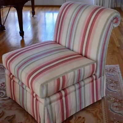 One of a pair of matching striped slipper chairs