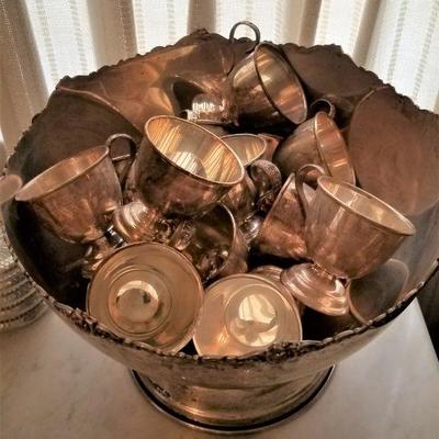 Silverplate punch bowl w/cups.