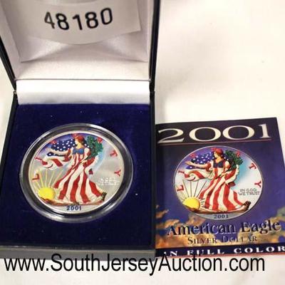  2001 American Eagle Silver Dollar in Full Color

Auction Estimate $20-$50 â€“ Located Glassware 