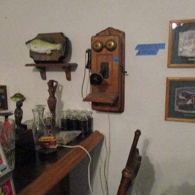 antique party line phone, and also billy bass, this estate is full of treasures ,everything must go this weekend